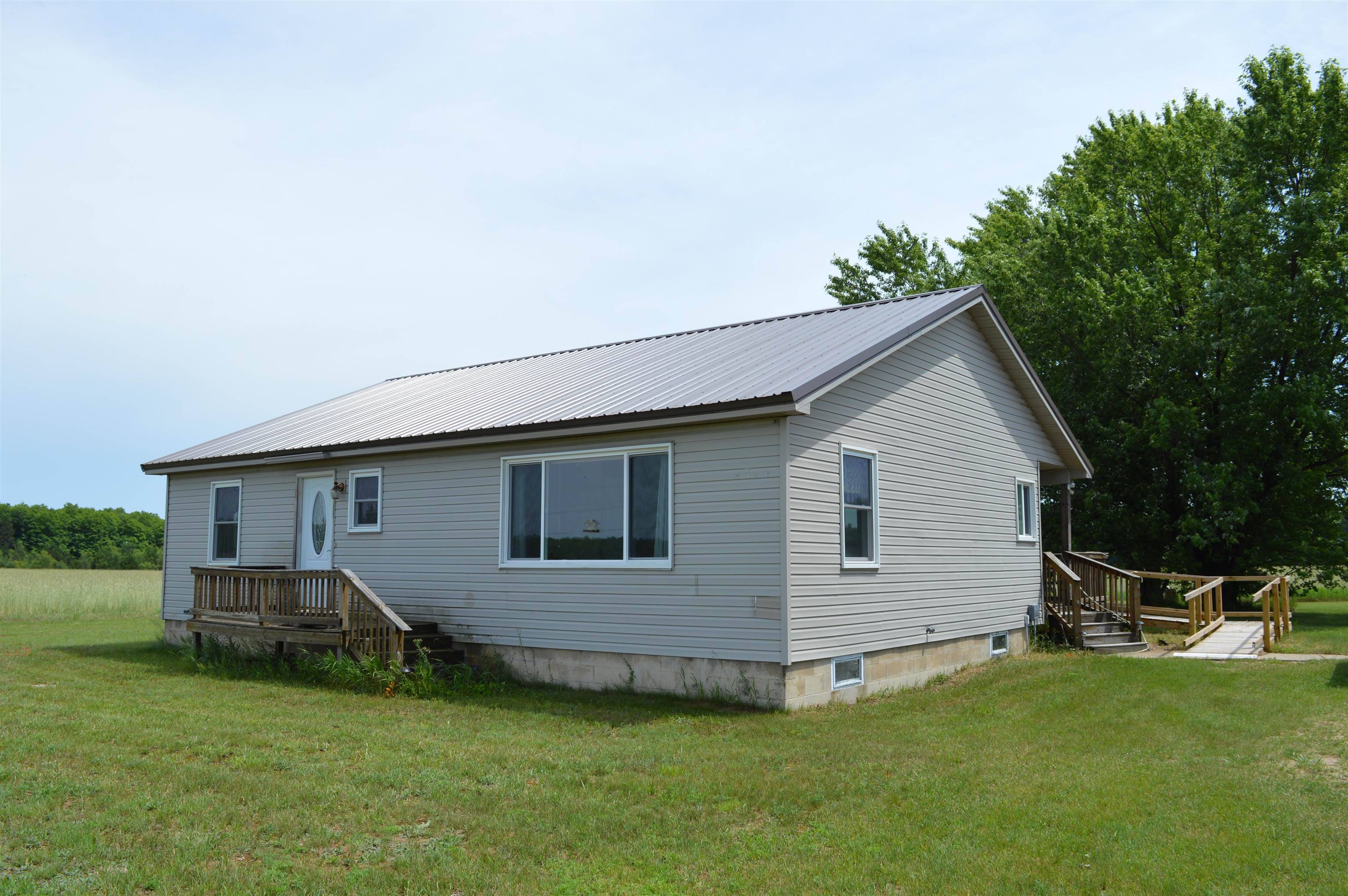 6268 E M-72, Excelsior Twp, MI 49646