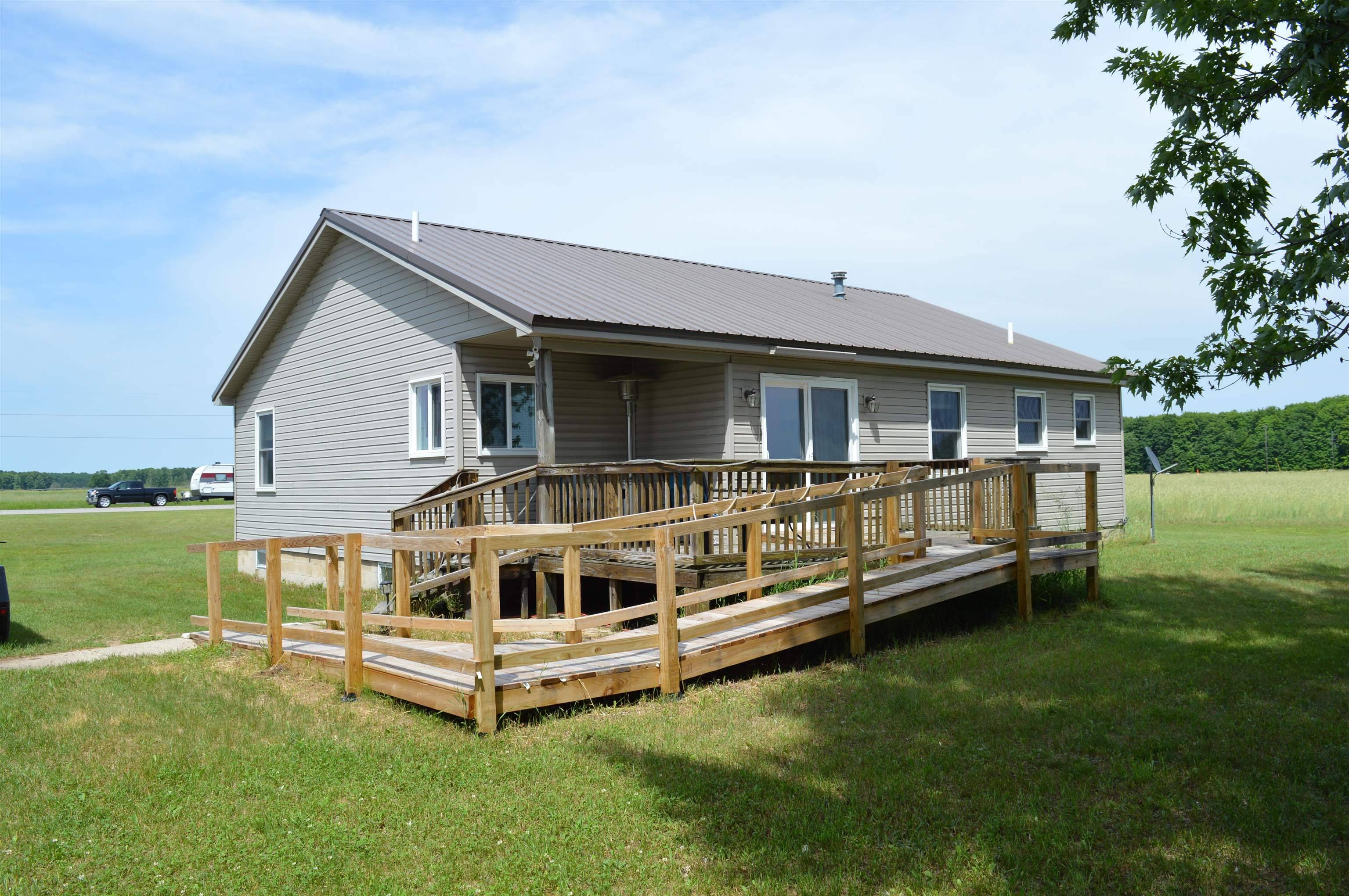 6268 E M-72, Excelsior Twp, MI 49646