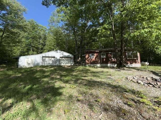 4933 E Johnson RD, Norwich Twp, MI 49651