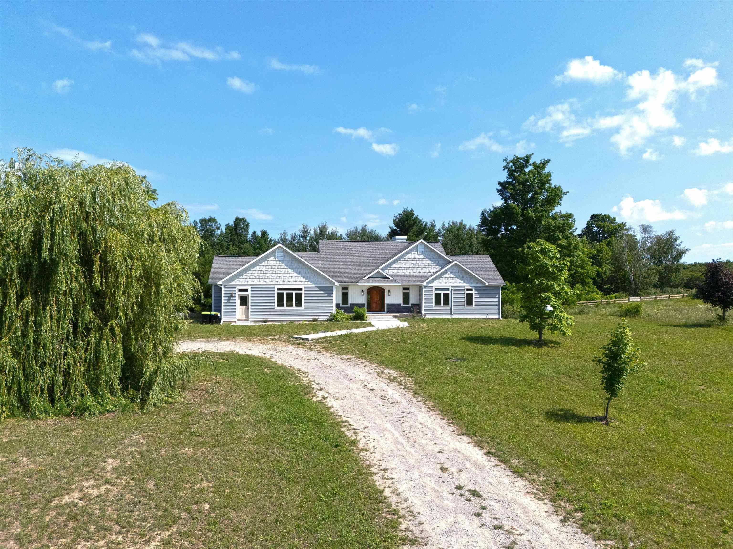 8255 Angell RD, Whitewater Twp, MI 49690