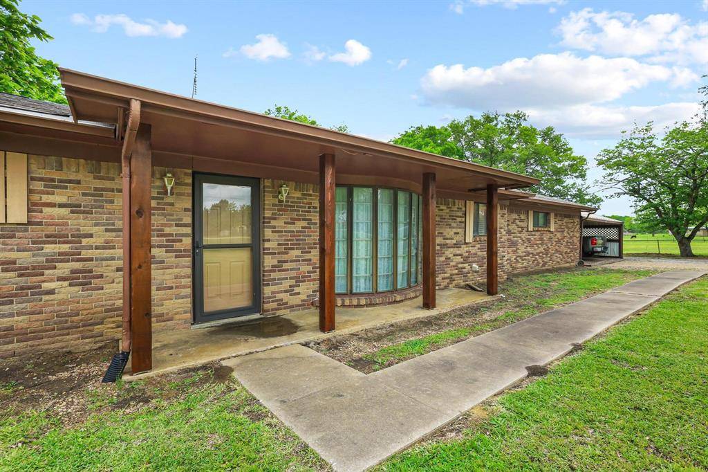 506 Fm 816, Wolfe City, TX 75496