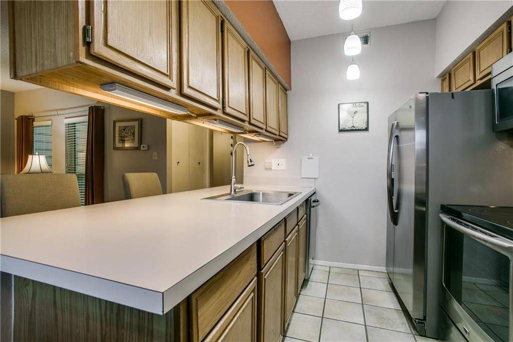 7107 Holly Hill Drive #104, Dallas, TX 75231