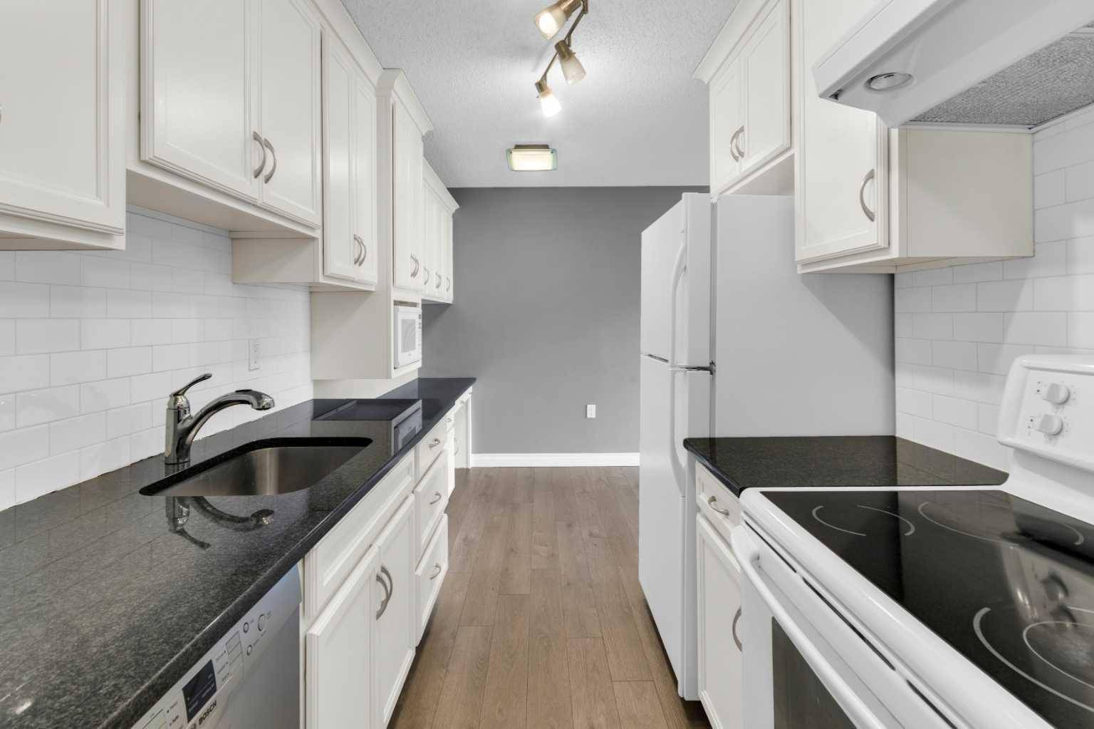 1602 11 AVE SW #210, Calgary, AB T3C 0N2