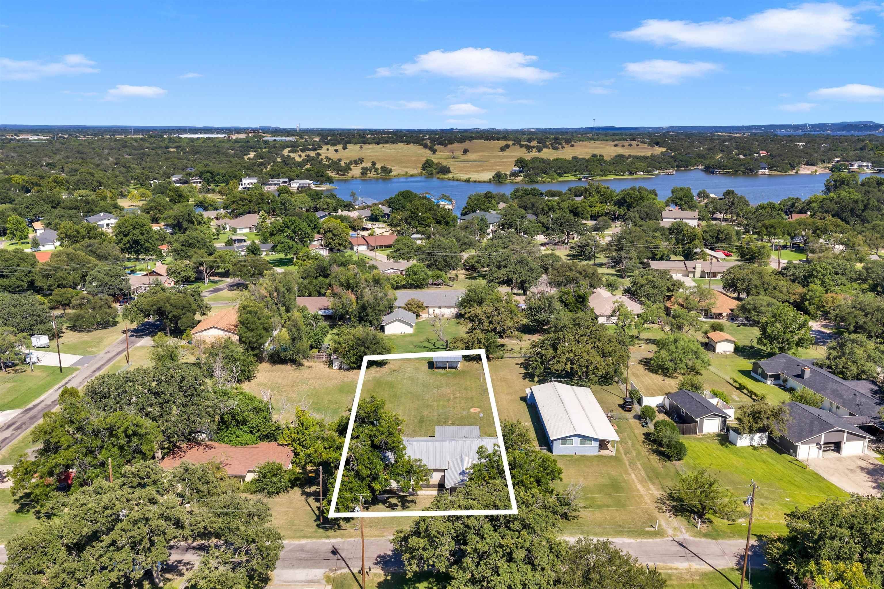 210 Robin RD, Highland Haven, TX 78654