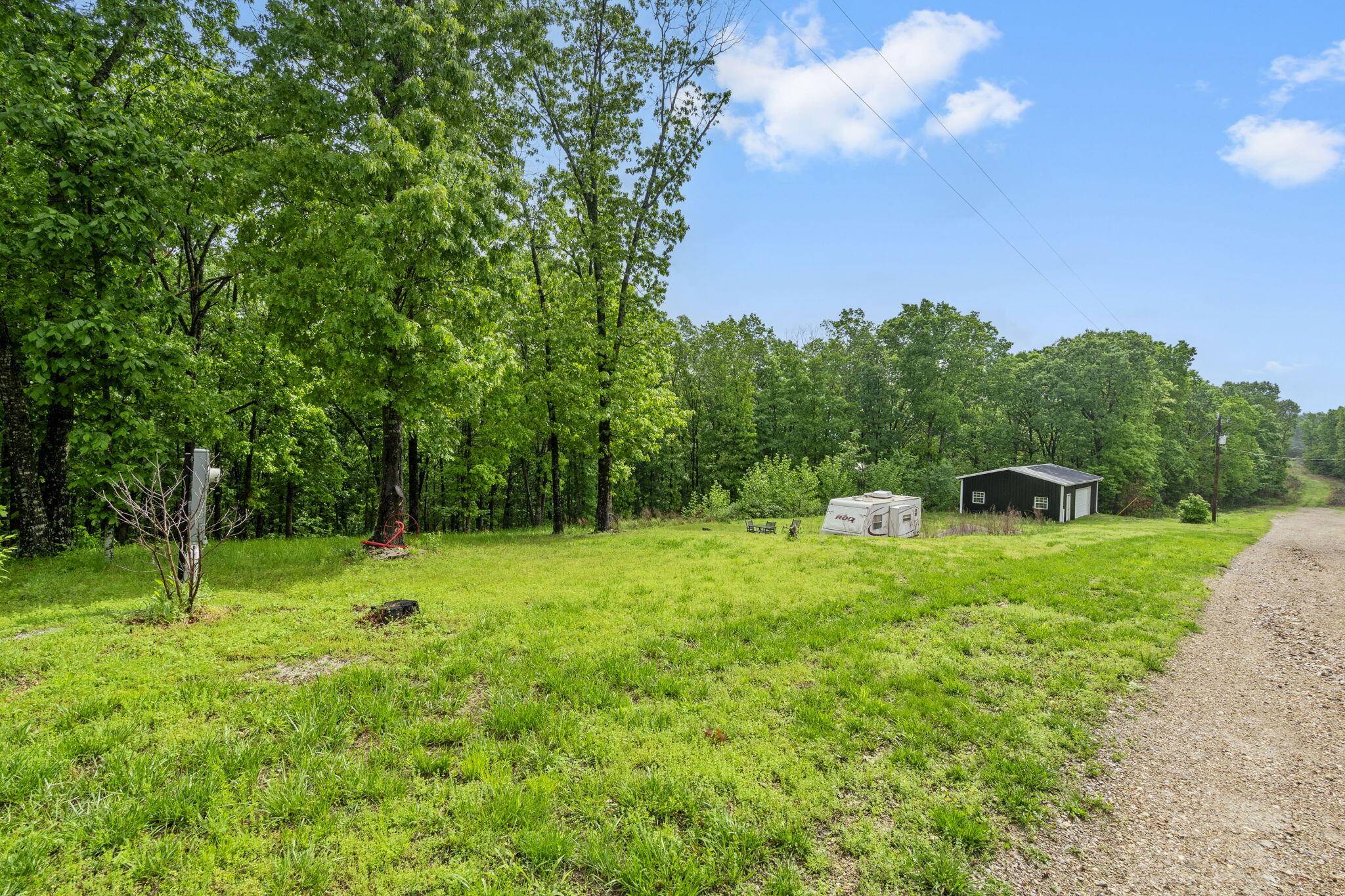 149 Rosemary LN, Lampe, MO 65681