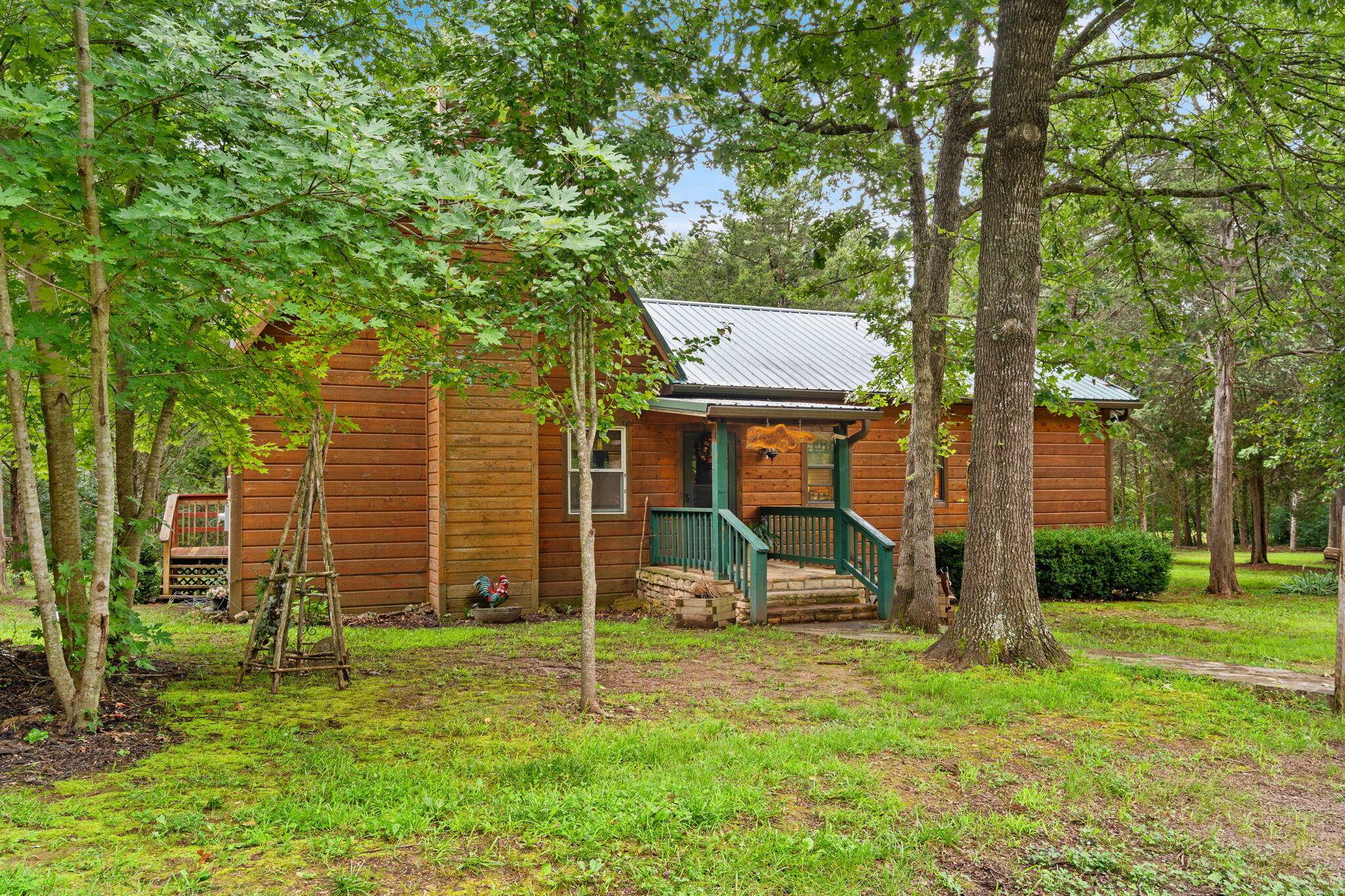 224 Tom Smith TRL, Lampe, MO 65681