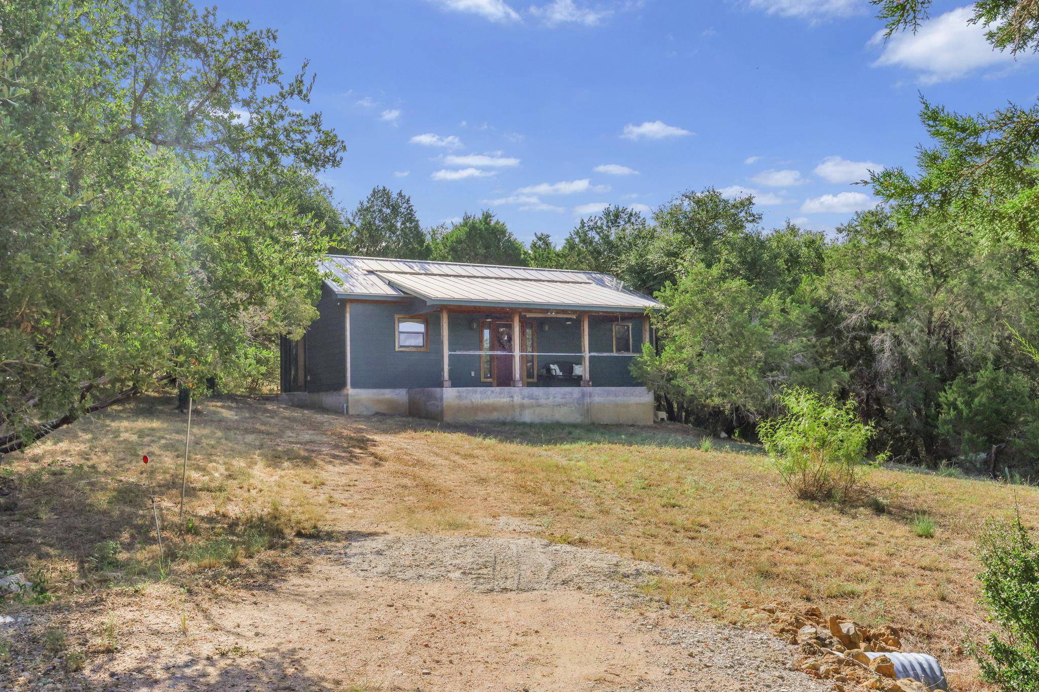 407 Breezing LN, Spicewood, TX 78669