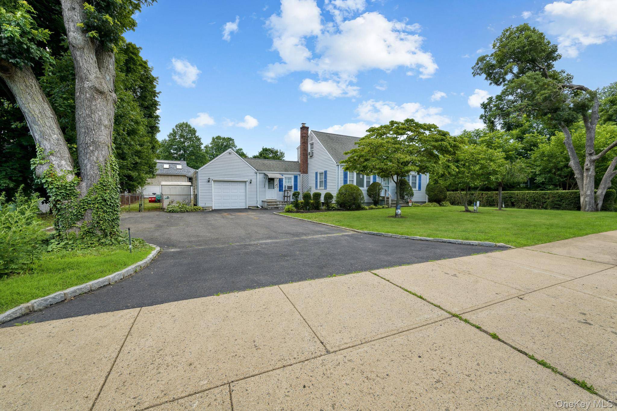 1547 Walt Whitman RD, Melville, NY 11747