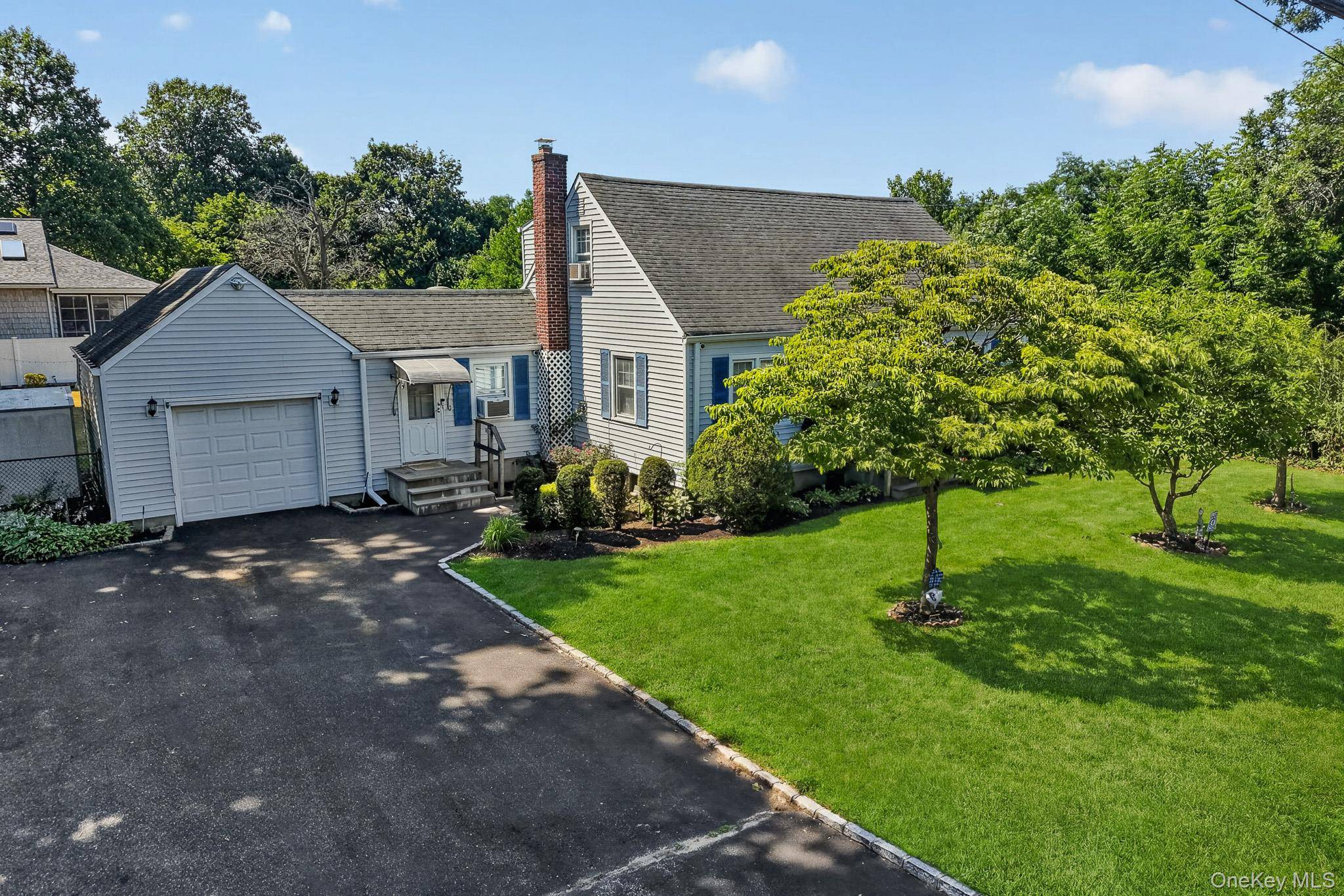 1547 Walt Whitman RD, Melville, NY 11747