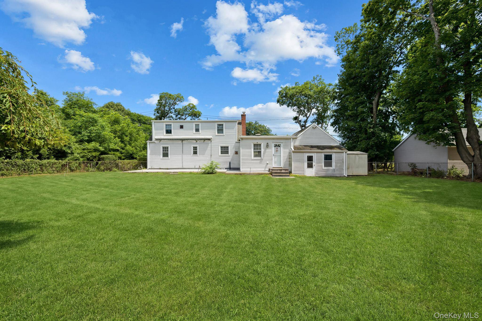 1547 Walt Whitman RD, Melville, NY 11747