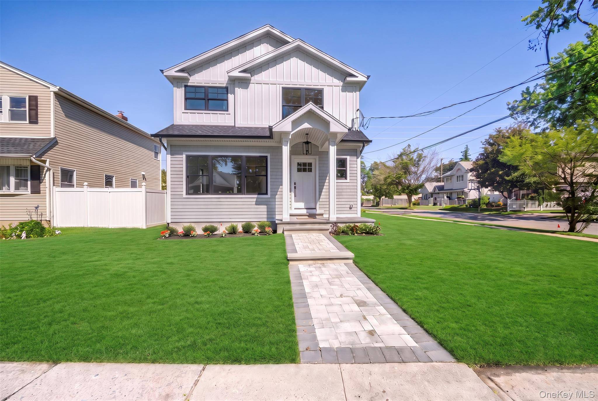 97 Broadmoor LN, Westbury, NY 11590