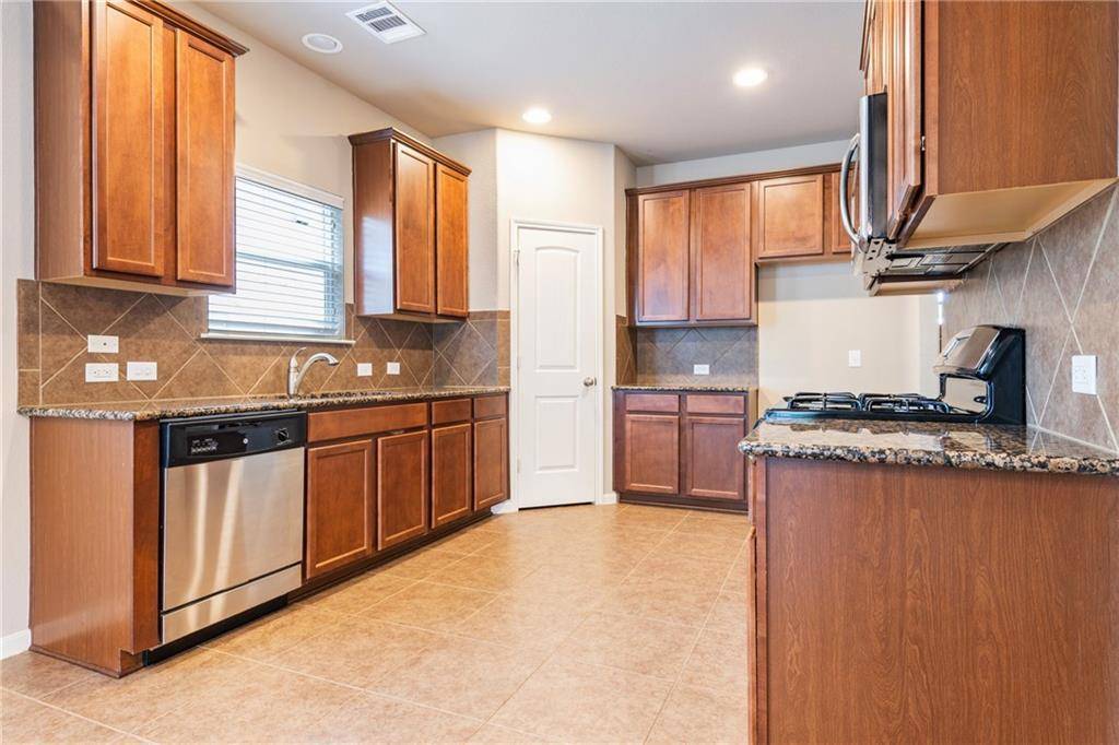 11411 Buster Crabbe DR, Austin, TX 78748