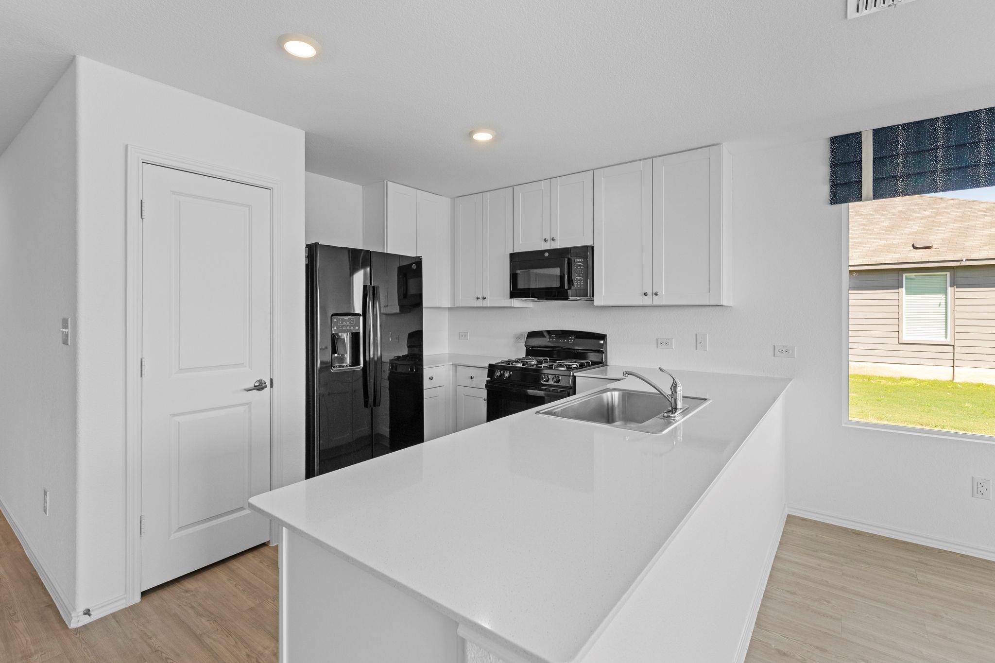 13216 Eastland DR, Mustang Ridge, TX 78610