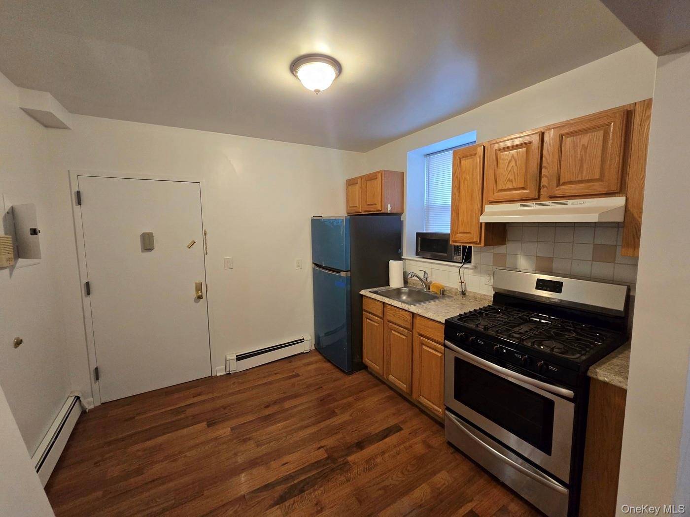 92-14 95th AVE, Ozone Park, NY 11416