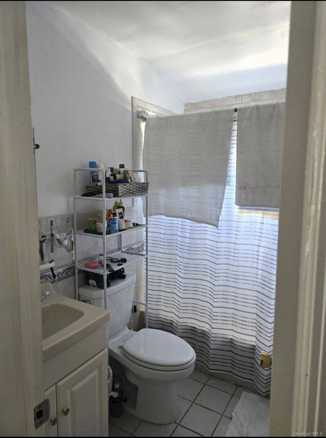 14217 135th AVE, South Ozone Park, NY 11436
