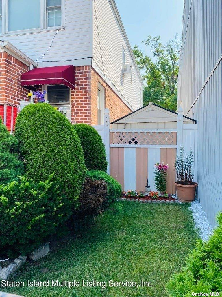 97-47 94 Th Street, Ozone Park, NY 11416