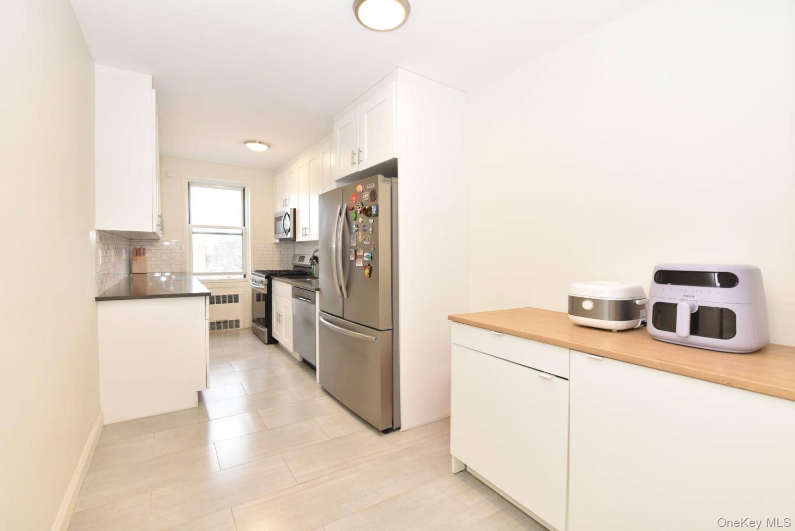 64-11 99 ST #418, Rego Park, NY 11374