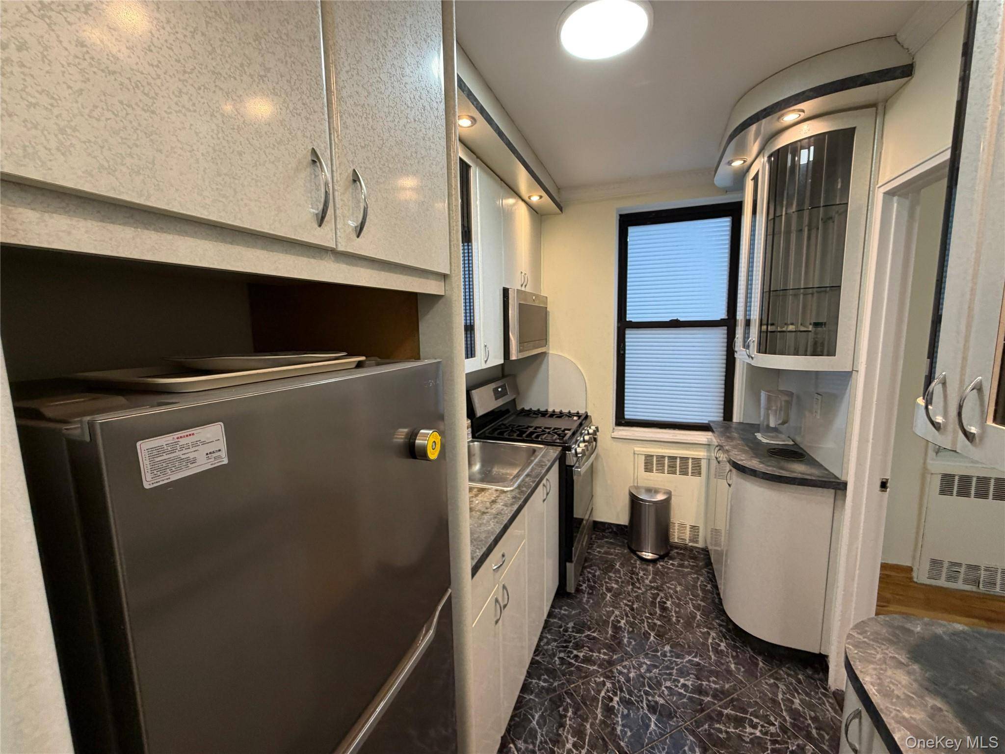 99-63 66th AVE #B12, Rego Park, NY 11374