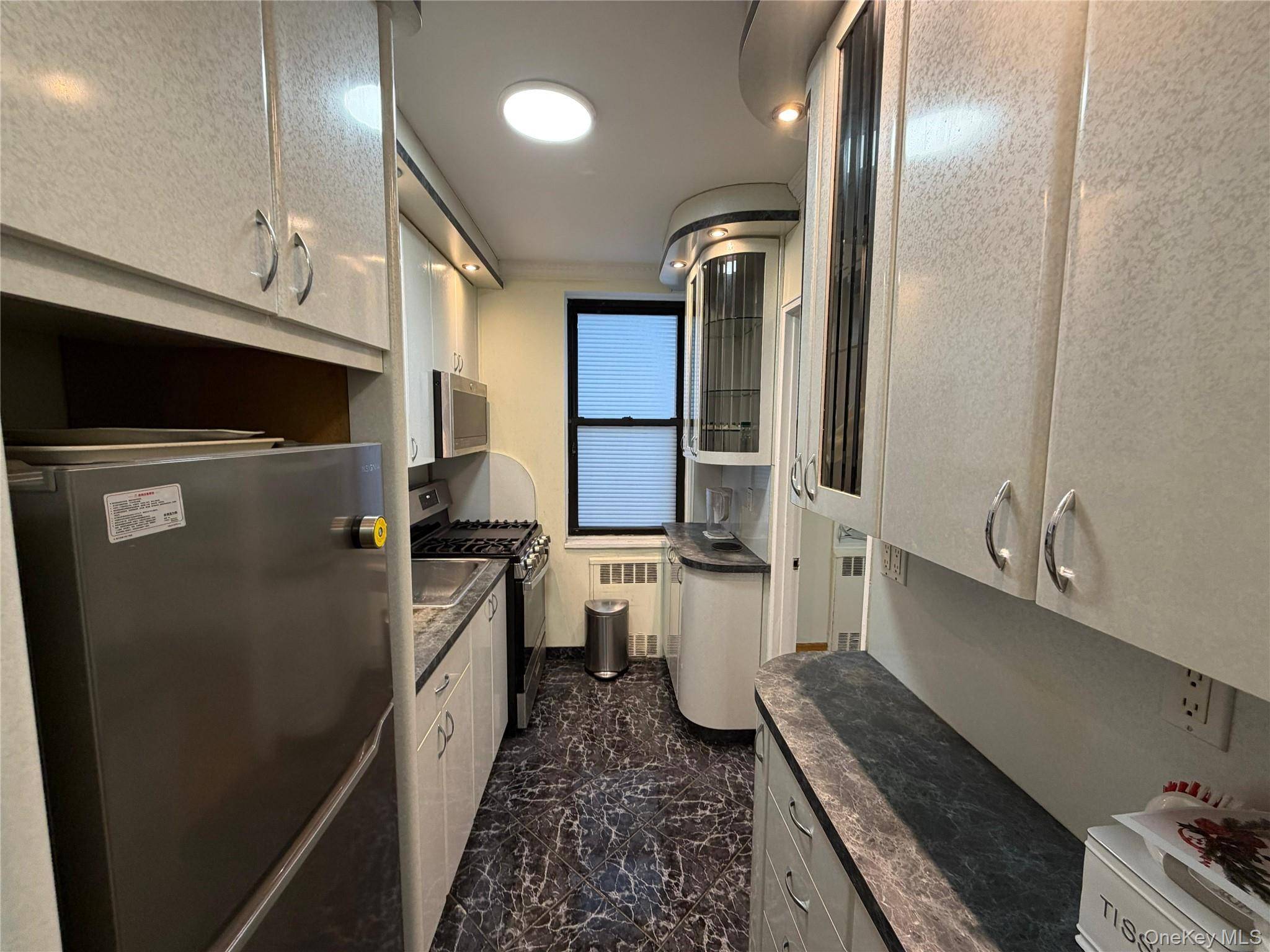 99-63 66th AVE #B12, Rego Park, NY 11374