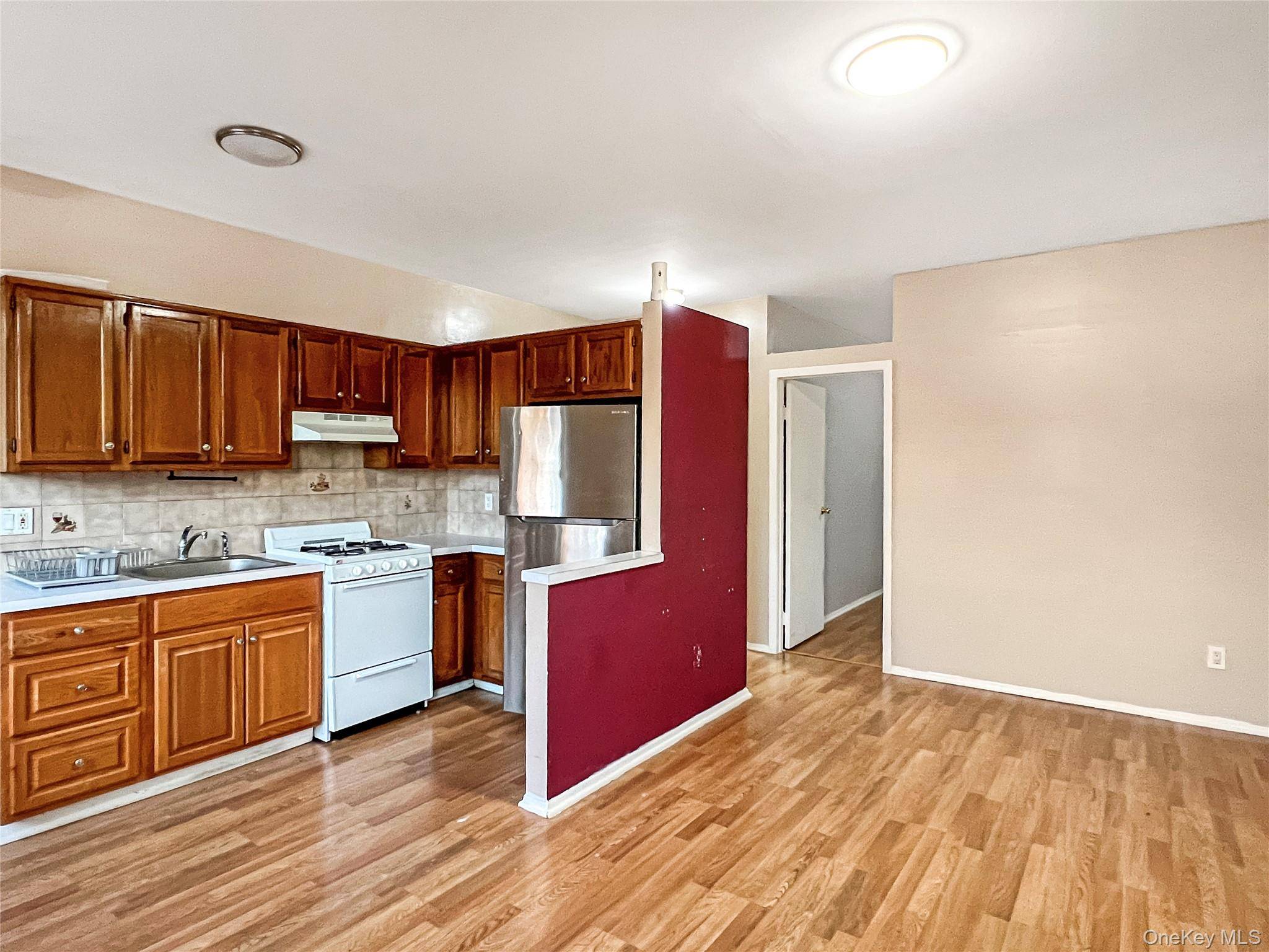 9206 95th AVE, Ozone Park, NY 11416