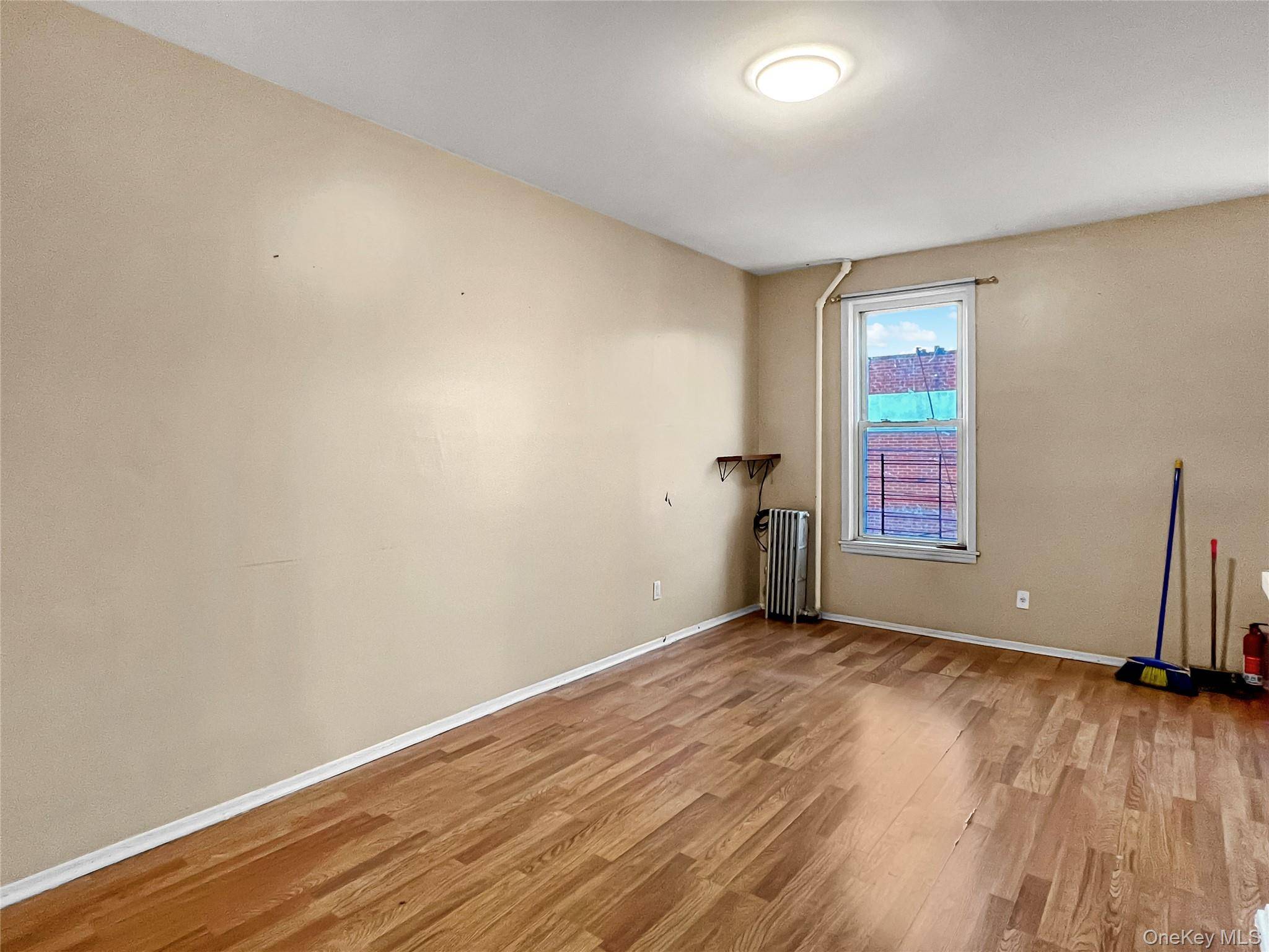 9206 95th AVE, Ozone Park, NY 11416