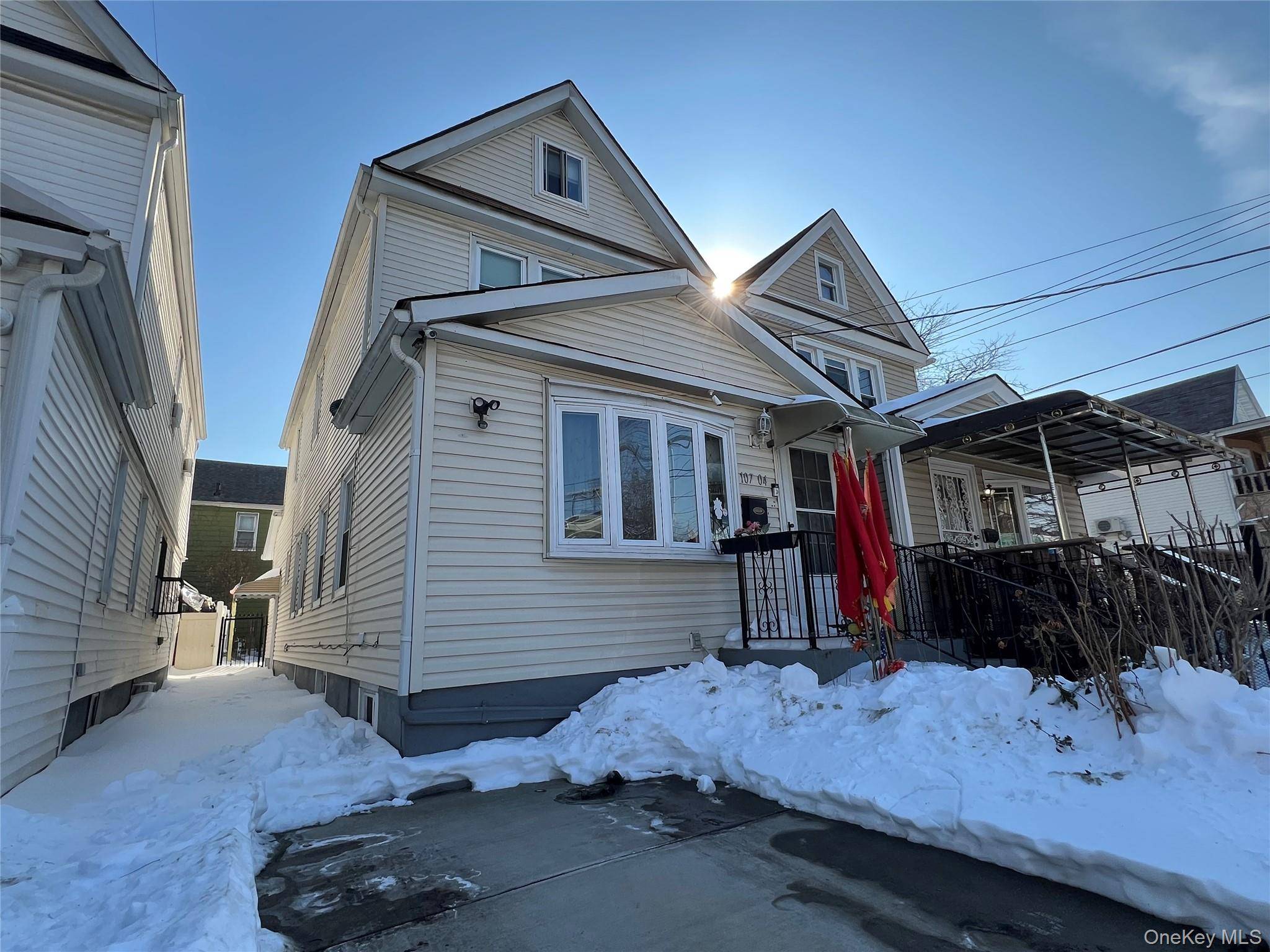 10704 103rd AVE, Ozone Park, NY 11417