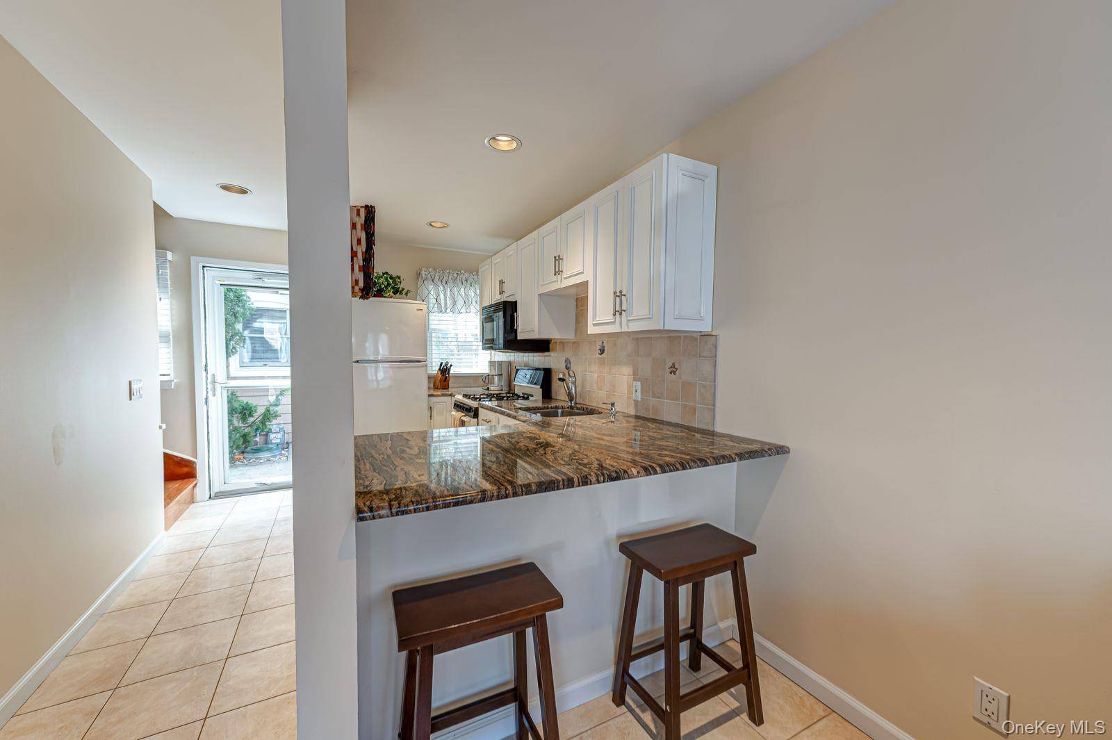49 Canoe Place RD #212, Hampton Bays, NY 11946