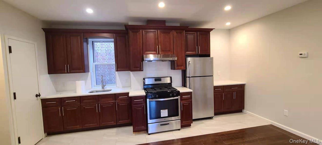 87-16 Britton AVE, Elmhurst, NY 11373