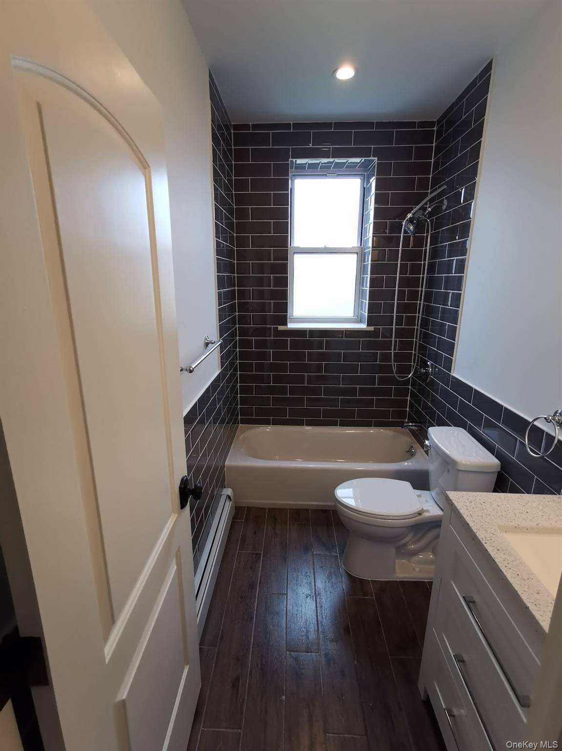 87-16 Britton AVE, Elmhurst, NY 11373