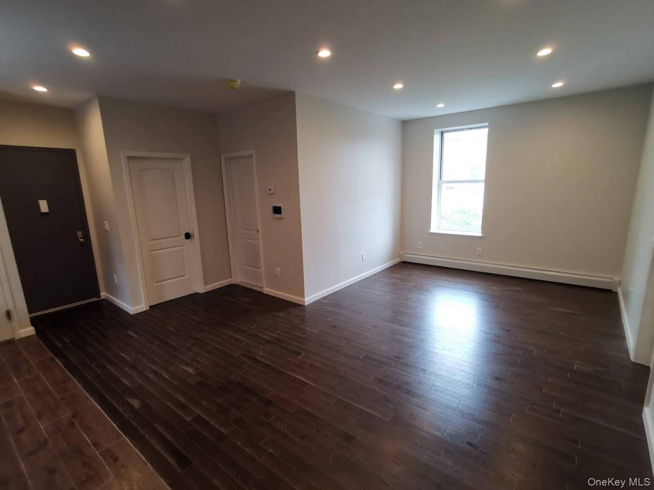 87-16 Britton AVE, Elmhurst, NY 11373