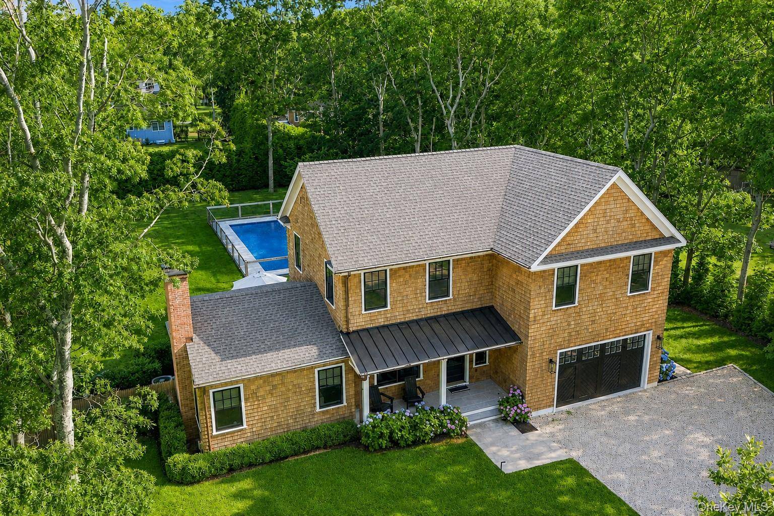 15 Wild Cherry LN, East Quogue, NY 11942