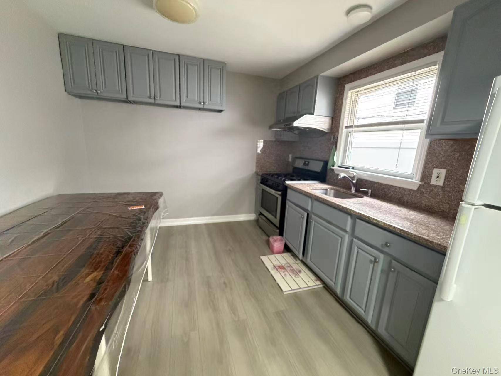 5715 224th ST, Oakland Gardens, NY 11364