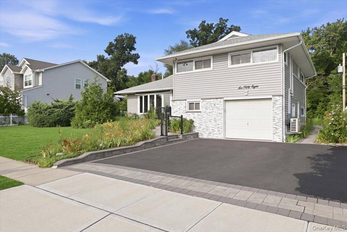 658 Richmond RD, East Meadow, NY 11554