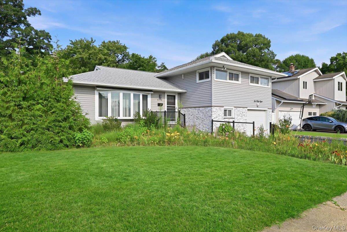 658 Richmond RD, East Meadow, NY 11554