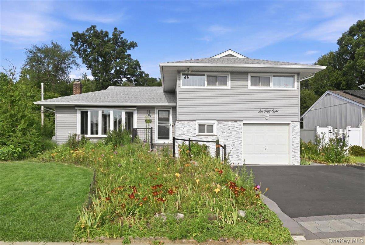 658 Richmond RD, East Meadow, NY 11554