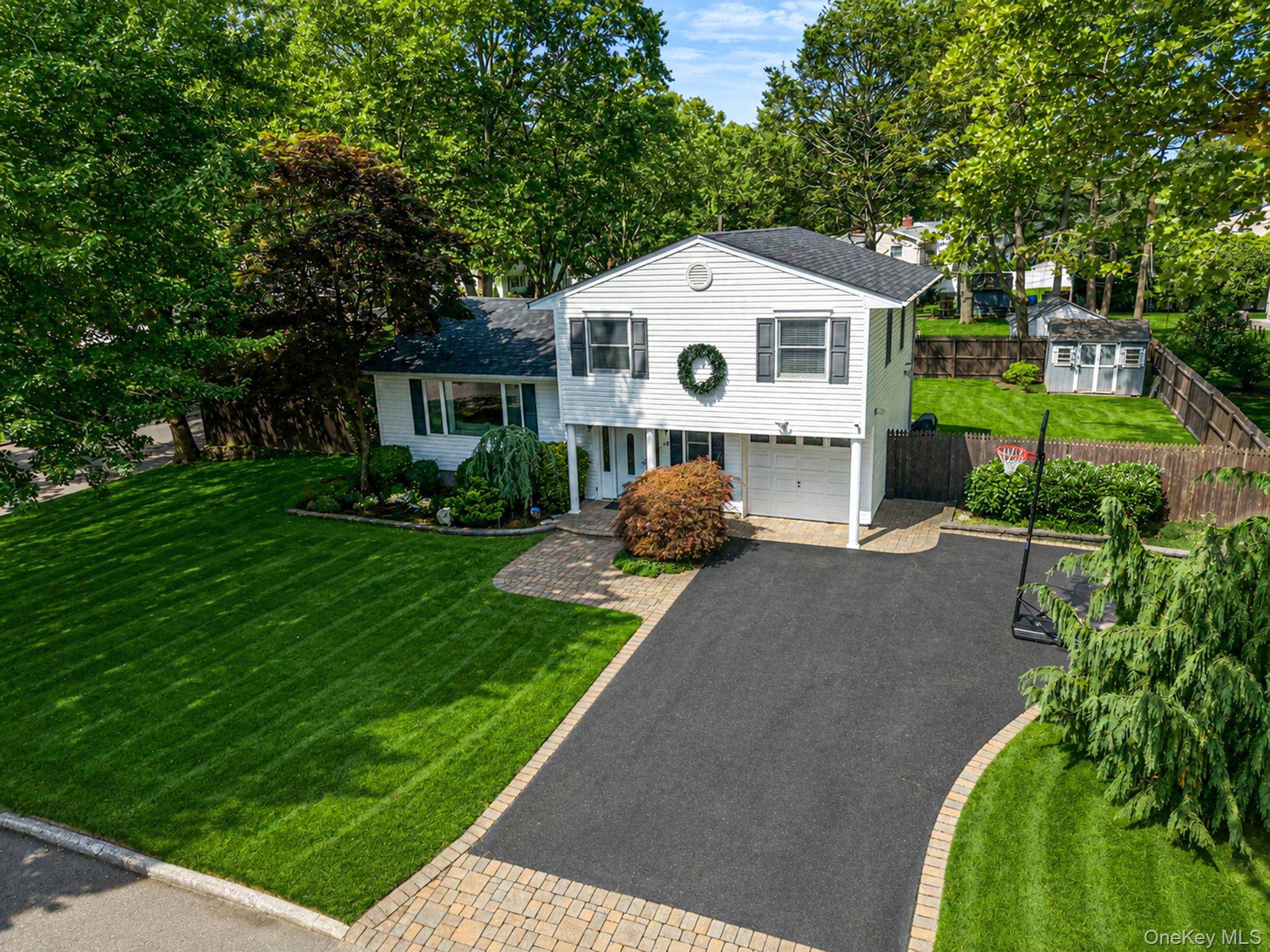 49 Munson CT, Melville, NY 11747