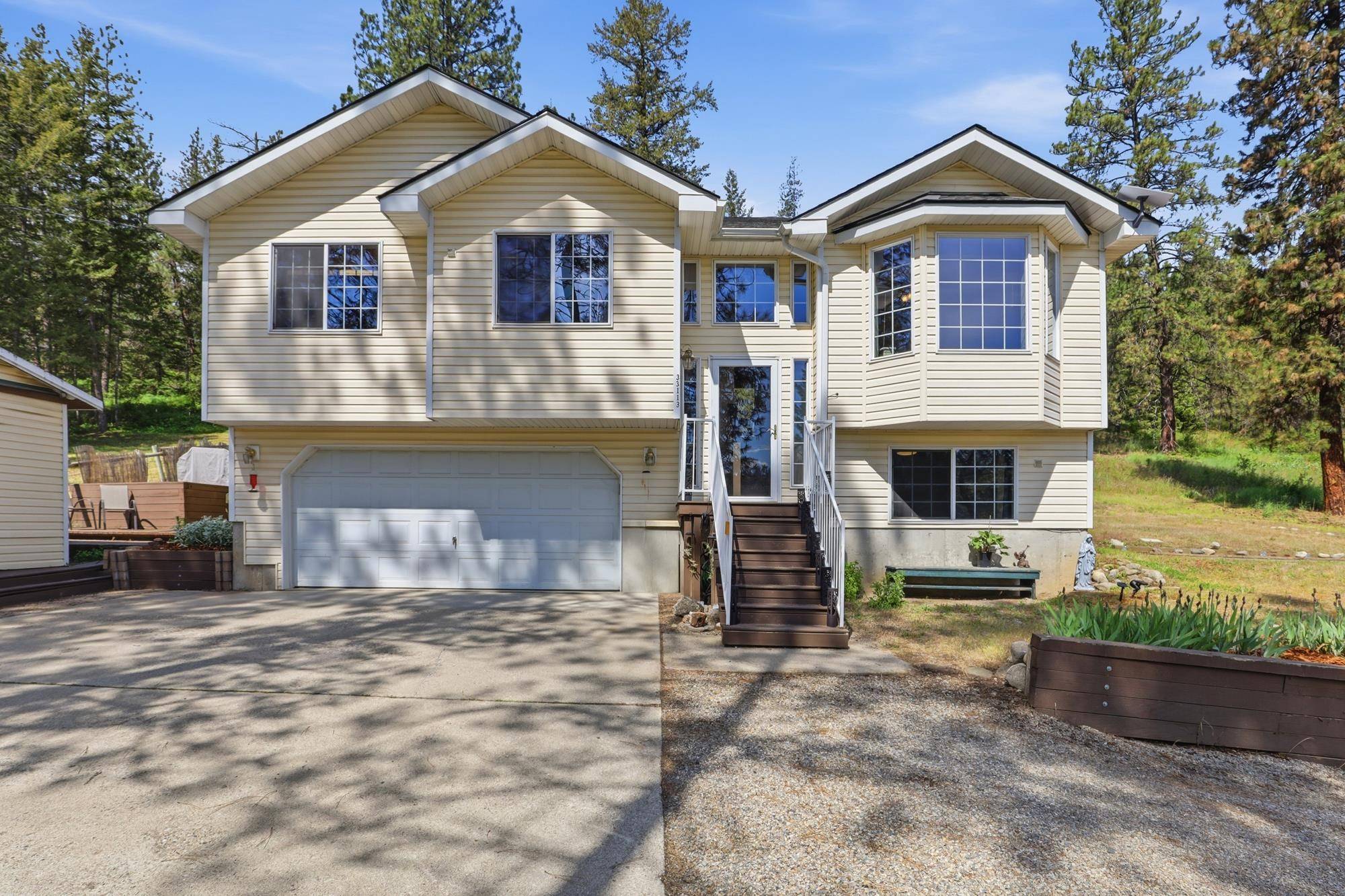 33113 N Milan Rd, Chattaroy, WA 99003
