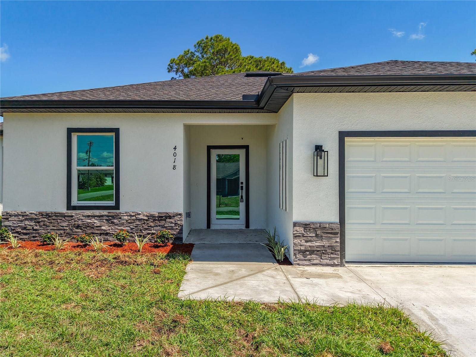 4018 3RD ST W, Lehigh Acres, FL 33971