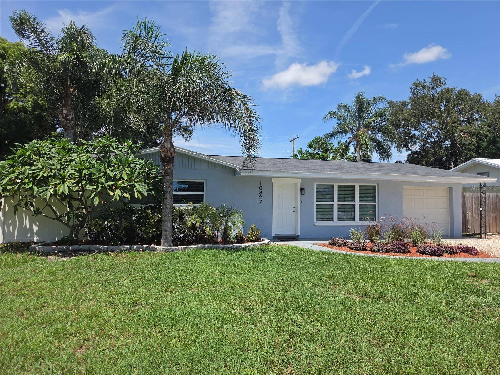 10827 VILLAGE GREEN AVE, Seminole, FL 33772