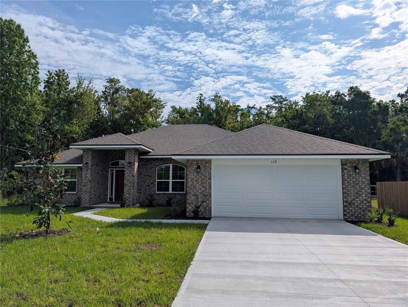 128 BIRD OF PARADISE DR, Palm Coast, FL 32137