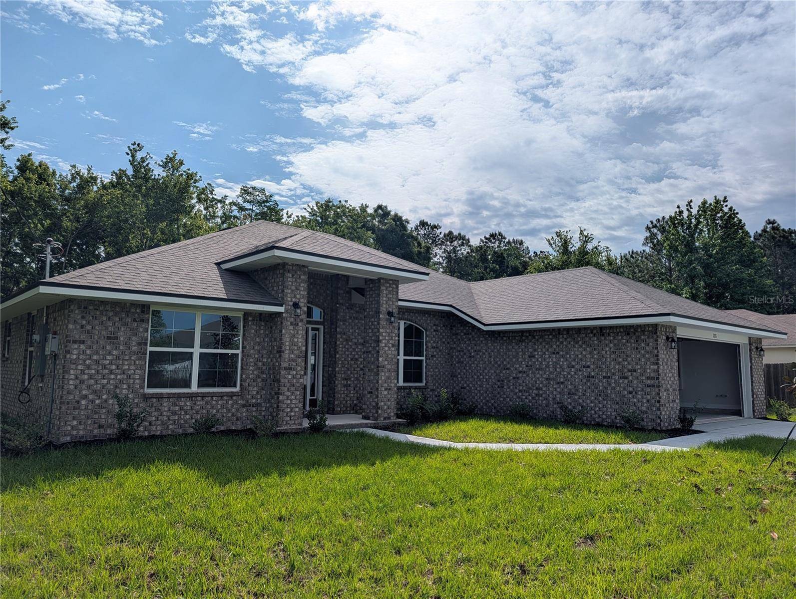 128 BIRD OF PARADISE DR, Palm Coast, FL 32137