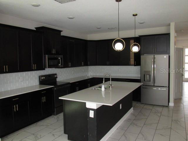 8982 CABOT CLIFFS DR, Davenport, FL 33896