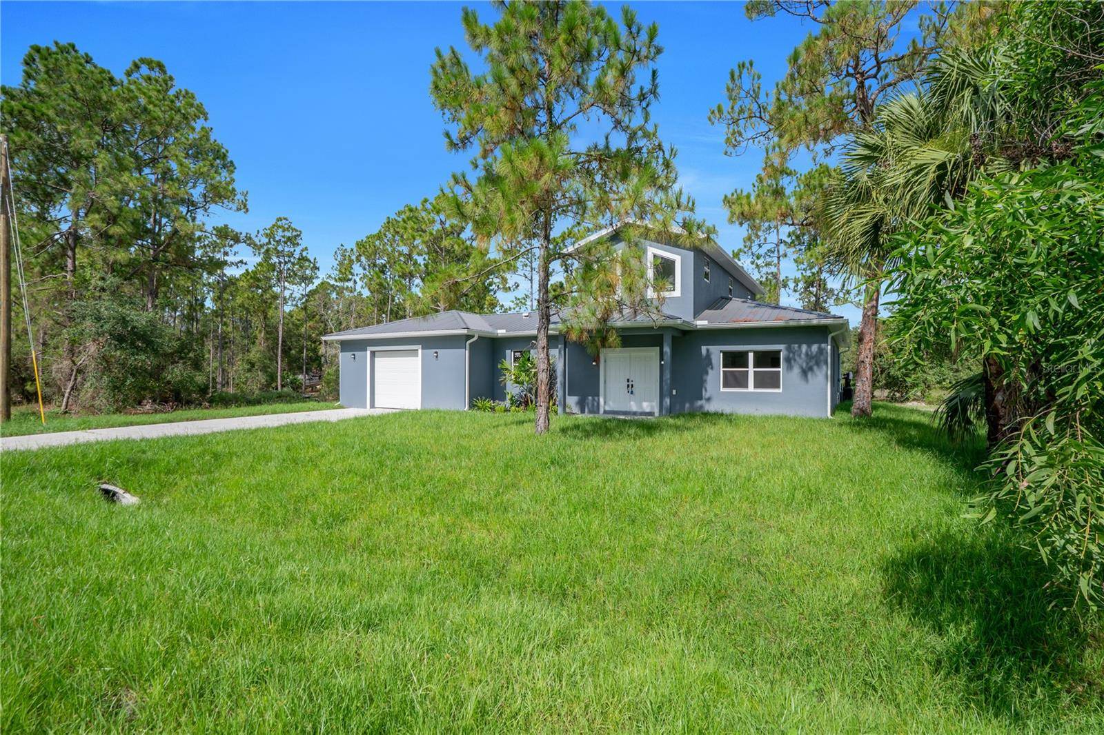317 JOHNS AVE, Lehigh Acres, FL 33936