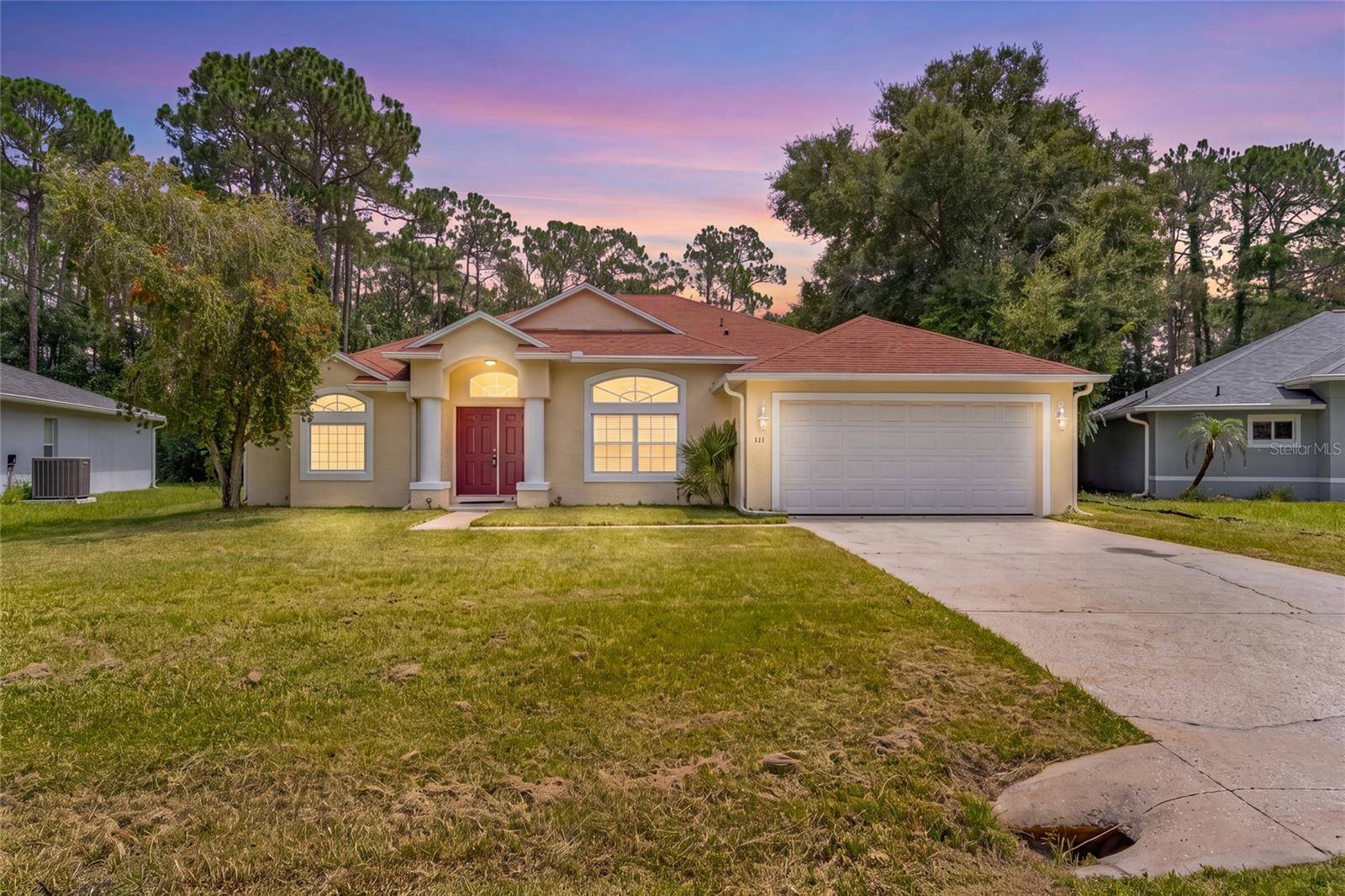 103 WOODSIDE DR, Palm Coast, FL 32164