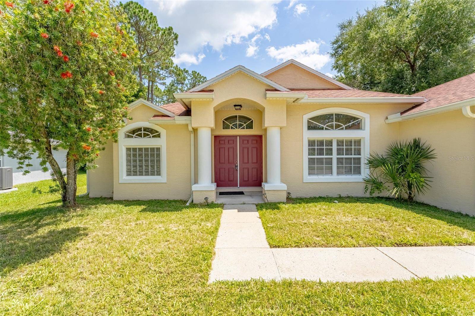 103 WOODSIDE DR, Palm Coast, FL 32164