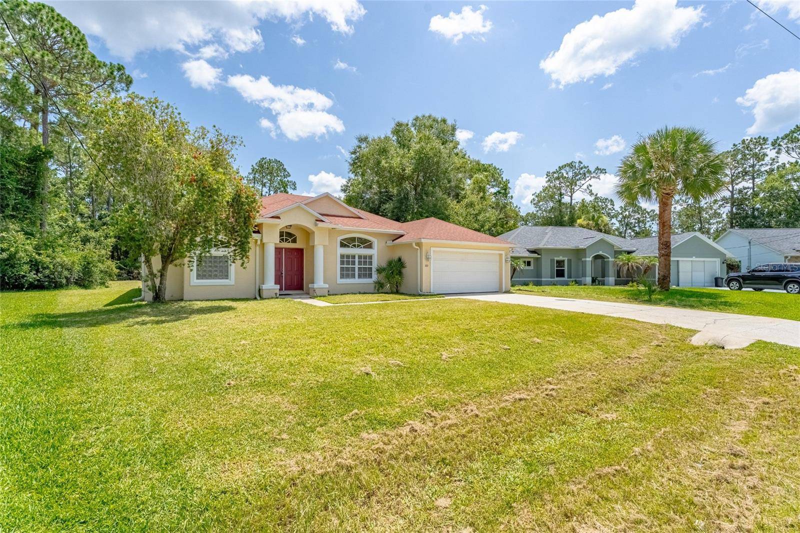 103 WOODSIDE DR, Palm Coast, FL 32164