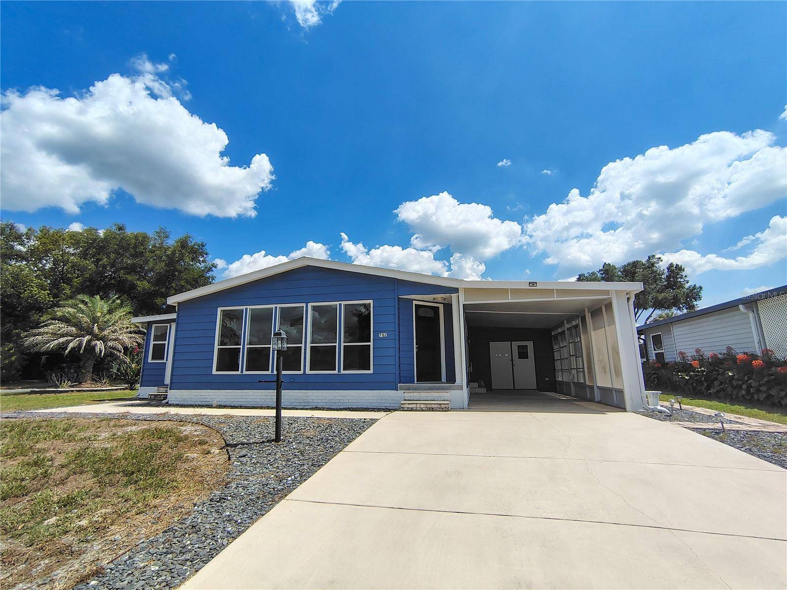 702 TURNBERRY LN, Lady Lake, FL 32159