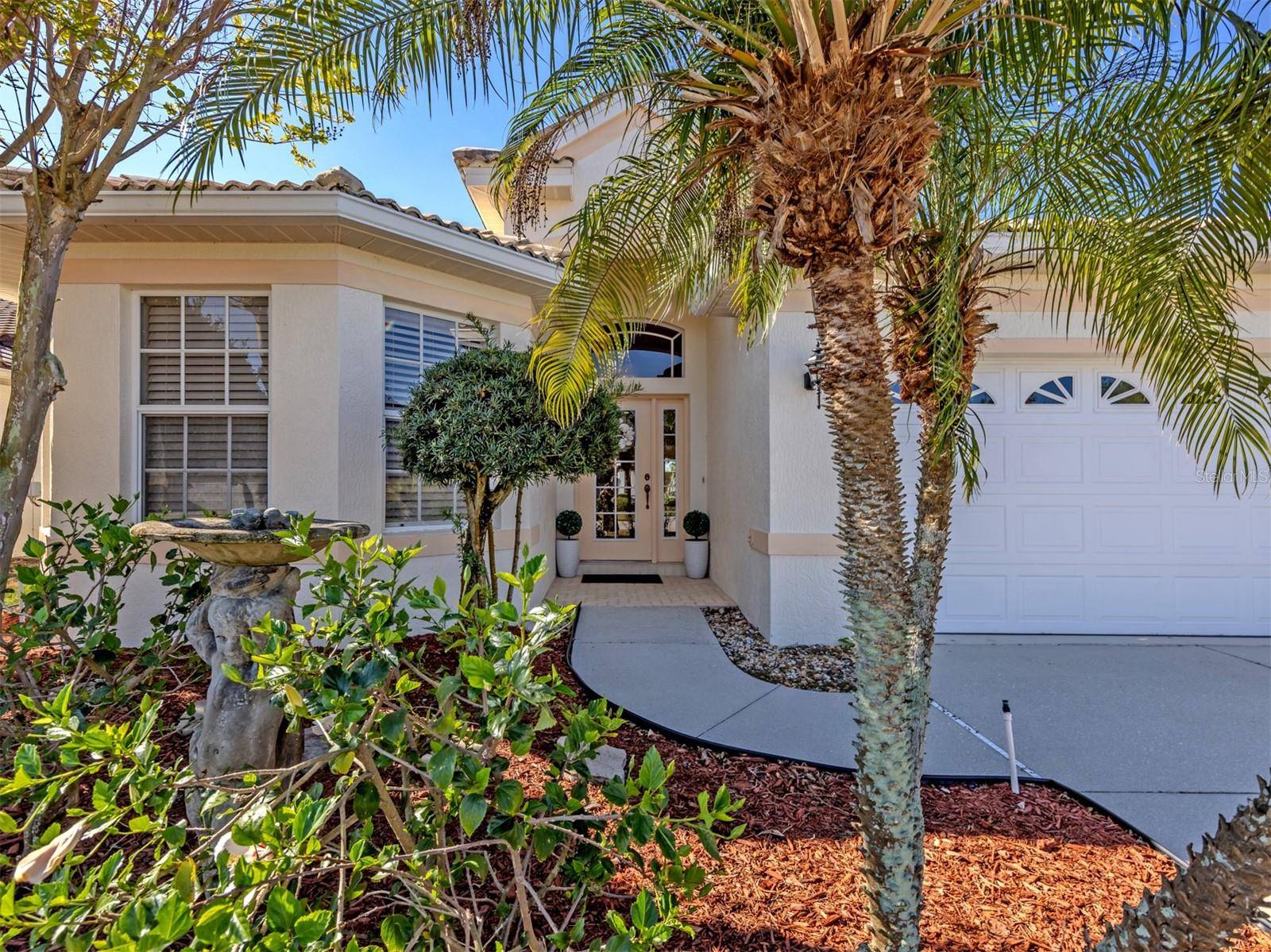 404 PINEWOOD LAKE DR, Venice, FL 34285