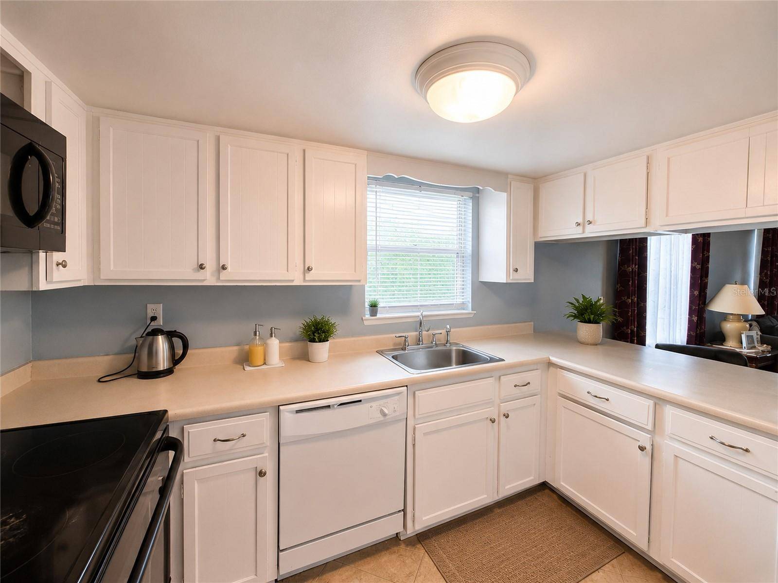 6008 AMBERLY AVE #F63, Orlando, FL 32822