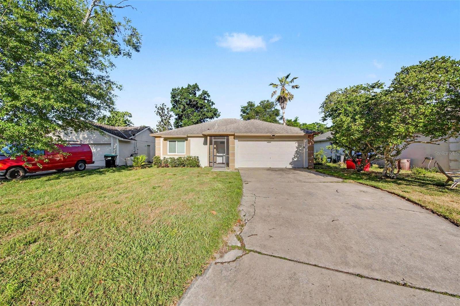 7734 LAKESIDE WOODS DR, Orlando, FL 32810
